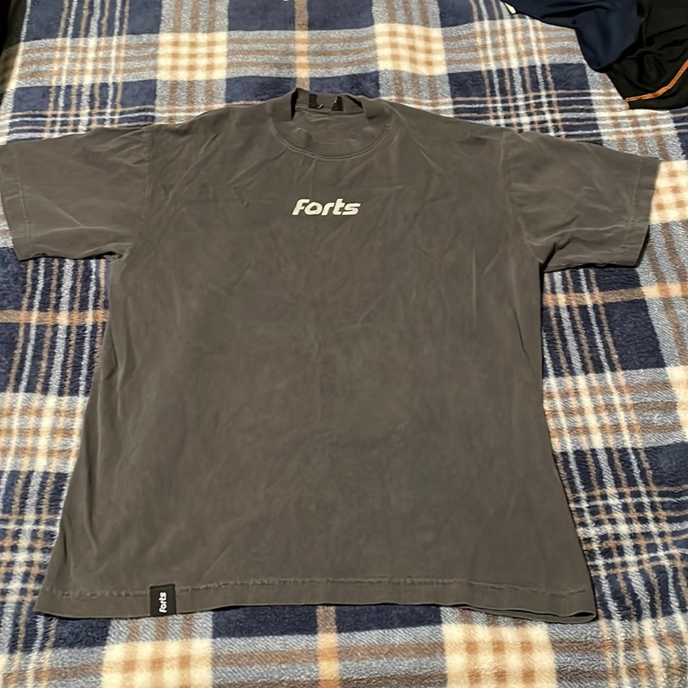 This is a Nashville brand. The shirt is a little oversized.